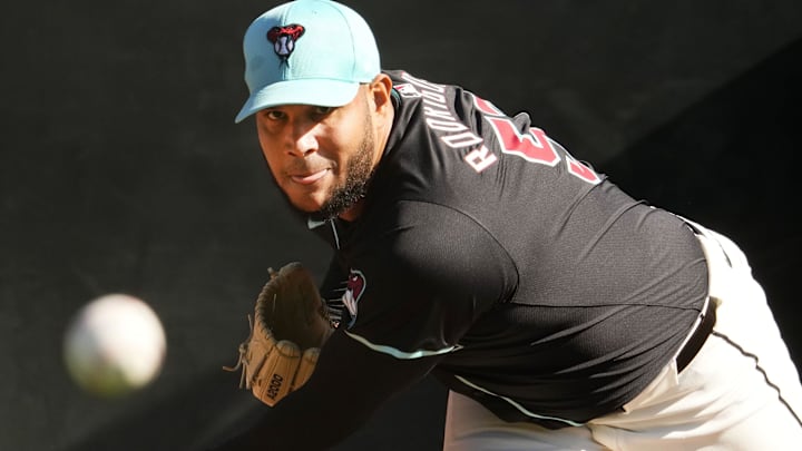 Arizona Diamondbacks pitcher Eduardo Rodriguez throws in the bullpen during spring training workouts