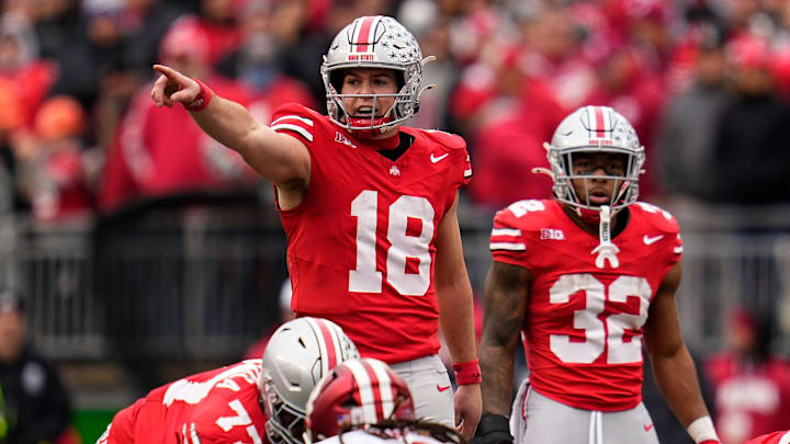 Ohio State Buckeyes quarterback Will Howard (18) signals to his offense during the second half Ohio State Buckeyes quarterback Will Howard (18) signals to his offense during the second half
