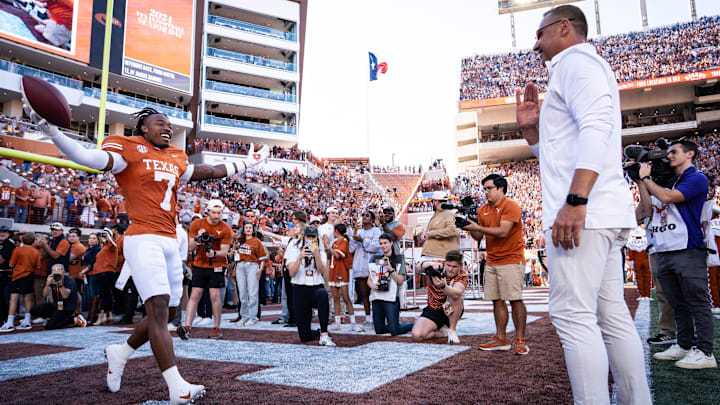 Texas Longhorns head coach Steve Sarkisian embraces defensive back Jahdae Barron (7) as Barron is honored as one of Texas' seniors in their last home game pf the season against the Kentucky Wildcats at Darrell K Royal Texas Memorial Stadium in Austin, Nov. 23, 2024.