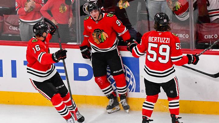 Oct 6, 2026; Chicago, Illinois, USA;  Chicago Blackhawks center Frank Nazar (91) celebrates with  center Anton Frondell (16)  and  left wing Tyler Bertuzzi (59) after he scores a goal against the St. Louis Blues during the third period at United Center.  Mandatory Credit: Matt Marton-Imagn Images