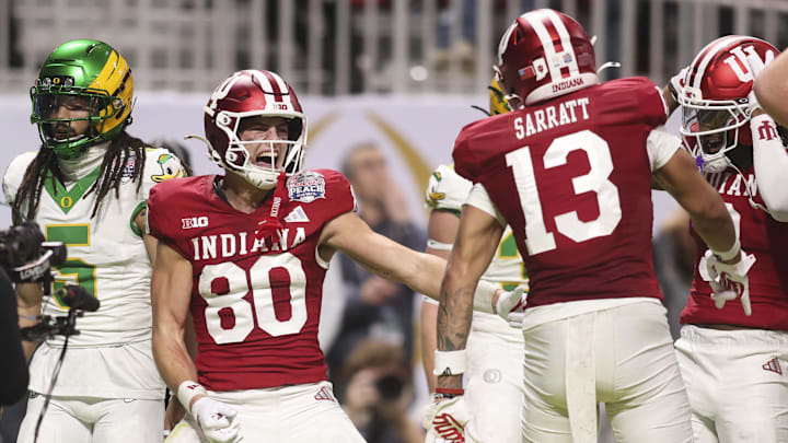 Indiana Hoosiers wide receiver Charlie Becker (80) celebrates his touchdown pass against the Oregon Ducks with IIndiana Hoosiers wide receiver Elijah Sarratt (13)