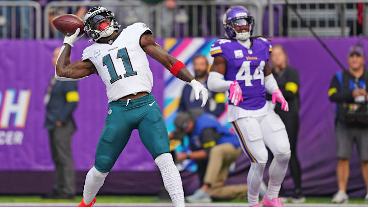 Oct 19, 2025; Minneapolis, Minnesota, USA; Philadelphia Eagles wide receiver A.J. Brown (11) celebrates after a touchdown during the first half against the Minnesota Vikings at U.S. Bank Stadium. Mandatory Credit: Brad Rempel-Imagn Images