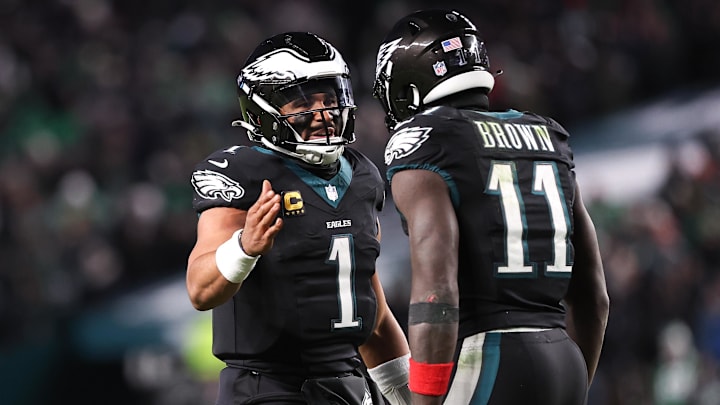 Nov 28, 2025; Philadelphia, Pennsylvania, USA; Philadelphia Eagles quarterback Jalen Hurts (1) and wide receiver A.J. Brown (11) celebrate their touchdown connection against the Chicago Bears at Lincoln Financial Field. Mandatory Credit: Bill Streicher-Imagn Images