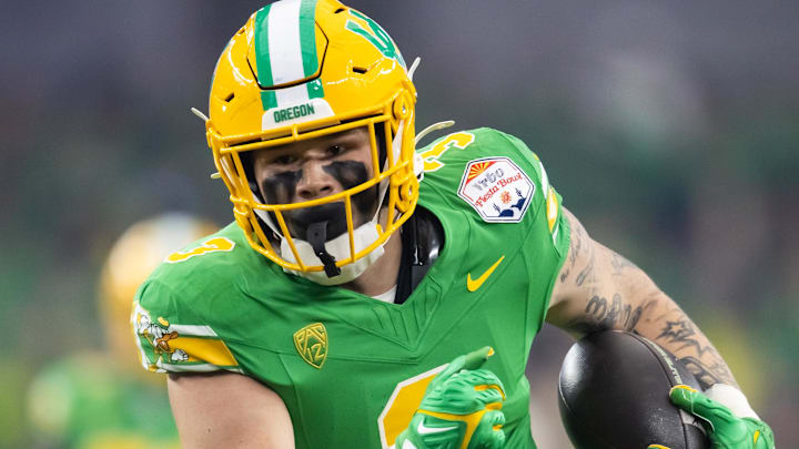 Jan 1, 2024; Glendale, AZ, USA; Oregon Ducks tight end Terrance Ferguson (3) against the Liberty Flames during the 2024 Fiesta Bowl at State Farm Stadium. Mandatory Credit: Mark J. Rebilas-Imagn Images
