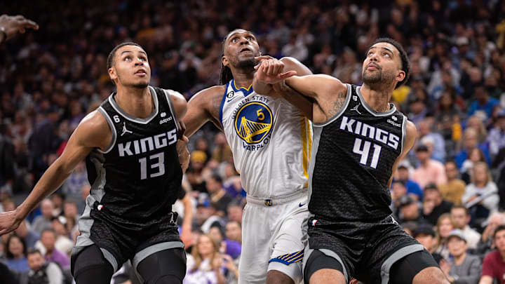 Apr 7, 2023; Sacramento, California, USA; Sacramento Kings forward Keegan Murray (13) and forward Trey Lyles (41) fight for position under the basket with Golden State Warriors forward Kevon Looney (5) during the third quarter at Golden 1 Center. Mandatory Credit: Ed Szczepanski-Imagn Images Apr 7, 2023; Sacramento, California, USA; Sacramento Kings forward Keegan Murray (13) and forward Trey Lyles (41) fight for position under the basket with Golden State Warriors forward Kevon Looney (5) during the third quarter at Golden 1 Center. Mandatory Credit: Ed Szczepanski-Imagn Images