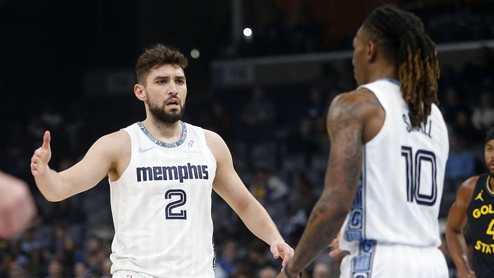 Feb 25, 2026; Memphis, Tennessee, USA; Memphis Grizzlies guard Ty Jerome (2) reacts with guard Javon Small (10) during the first quarter against the Golden State Warriors at FedExForum. Feb 25, 2026; Memphis, Tennessee, USA; Memphis Grizzlies guard Ty Jerome (2) reacts with guard Javon Small (10) during the first quarter against the Golden State Warriors at FedExForum.