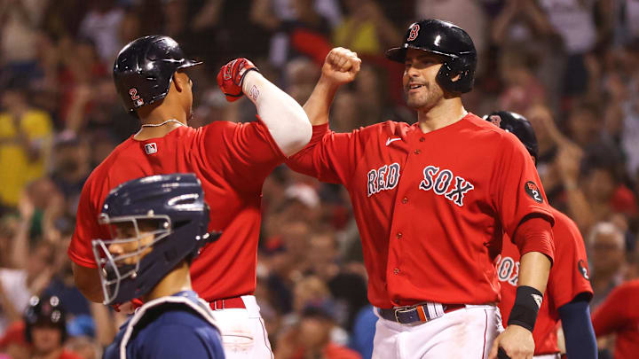 Aug 26, 2022; Boston, Massachusetts, USA; Boston Red Sox shortstop Xander Bogaerts (2) celebrates with Boston Red Sox designated hitter JD Martinez (28) after hitting a three run home run during the sixth inning against the Tampa Bay Rays at Fenway Park. Mandatory Credit: Paul Rutherford-Imagn Images