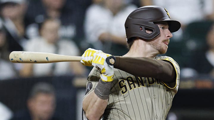 Sep 19, 2025; Chicago, Illinois, USA; San Diego Padres first baseman Ryan O'Hearn (32) hits an RBI-single against the Chicago White Sox during the fourth inning at Rate Field. Mandatory Credit: Kamil Krzaczynski-Imagn Images