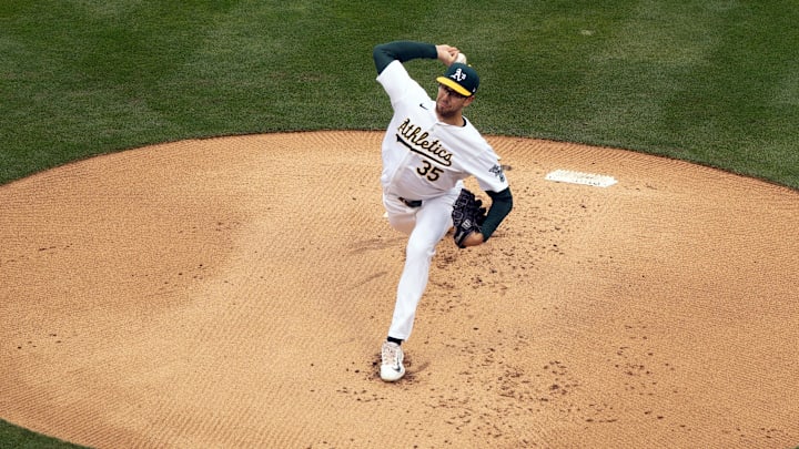 Apr 13, 2024; Oakland, California, USA; Oakland Athletics starting pitcher Joe Boyle (35) delivers a pitch against the Washington Nationals during the first inning at Oakland-Alameda County Coliseum. Mandatory Credit: D. Ross Cameron-Imagn Images
