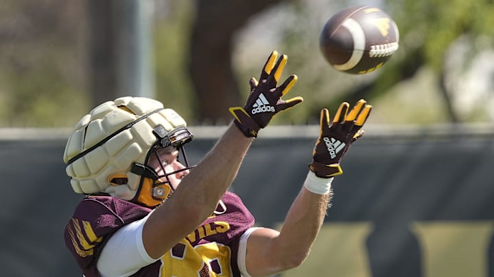 Arizona State wide receiver Harry Hassmann (89) catches the ball during football practice at Kajikawa practice fields in Tempe on Aug 1, 2025.