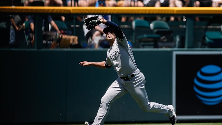 Jul 16, 2023; Denver, Colorado, USA; New York Yankees left fielder Isiah Kiner-Falefa (12) makes a catch in the second inning against the Colorado Rockies at Coors Field. Mandatory Credit: Isaiah J. Downing-Imagn Images Jul 16, 2023; Denver, Colorado, USA; New York Yankees left fielder Isiah Kiner-Falefa (12) makes a catch in the second inning against the Colorado Rockies at Coors Field. Mandatory Credit: Isaiah J. Downing-Imagn Images