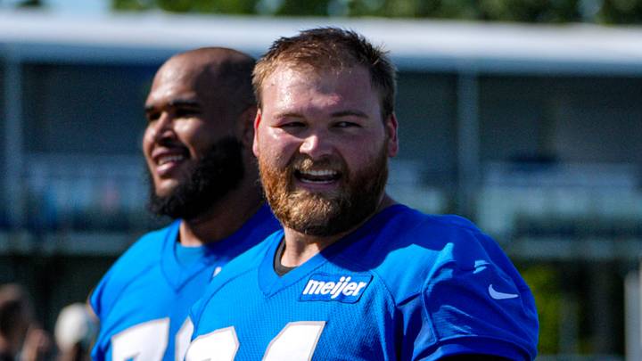 Detroit Lions center Cade Mays (64), left, talks to offensive tackle Penei Sewell (58) as they walk off the field after practice during training camp at Meijer Performance Center in Allen Park on Wednesday, July 29, 2026. Detroit Lions center Cade Mays (64), left, talks to offensive tackle Penei Sewell (58) as they walk off the field after practice during training camp at Meijer Performance Center in Allen Park on Wednesday, July 29, 2026.