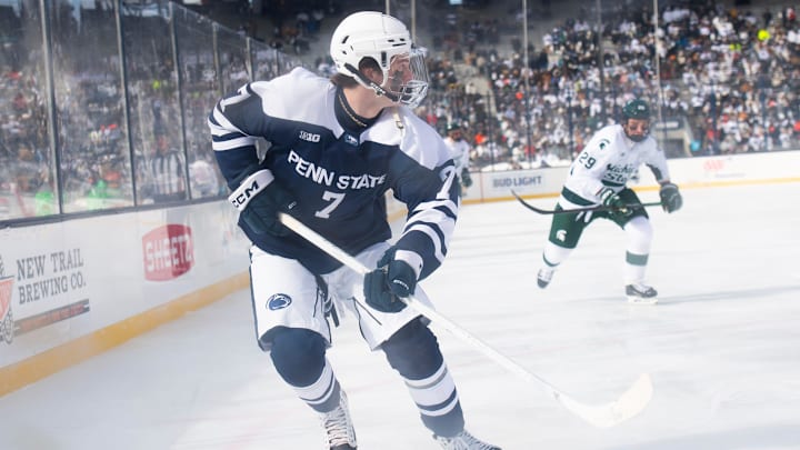 Penn State Nittany Lions defenseman Jackson Smith skates against the Michigan State Spartans during a Big Ten ice hockey game at Beaver Stadium. 
