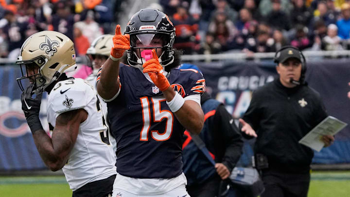  Bears wide receiver and former Husky Rome Odunze (15) signals a first down against New Orleans.