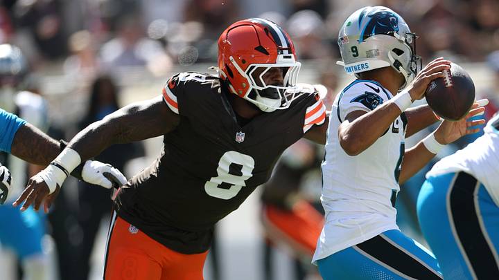 Sep 27, 2026; Cleveland, Ohio, USA; Carolina Panthers quarterback Bryce Young (9) looks to pass the ball under pressure from Cleveland Browns defensive end Jared Verse (8) during the first quarter at Huntington Bank Field. Mandatory Credit: Scott Galvin-Imagn Images Sep 27, 2026; Cleveland, Ohio, USA; Carolina Panthers quarterback Bryce Young (9) looks to pass the ball under pressure from Cleveland Browns defensive end Jared Verse (8) during the first quarter at Huntington Bank Field. Mandatory Credit: Scott Galvin-Imagn Images
