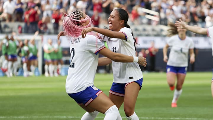 USWNT forward Trinity Rodman (left) celebrates her goal with forward Alyssa Thompson against Brazil at SoFi Stadium.