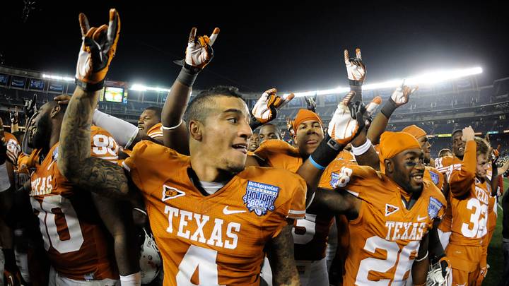Texas Longhorns safety Kenny Vaccaro (4) and teammates celebrate Texas Longhorns safety Kenny Vaccaro (4) and teammates celebrate