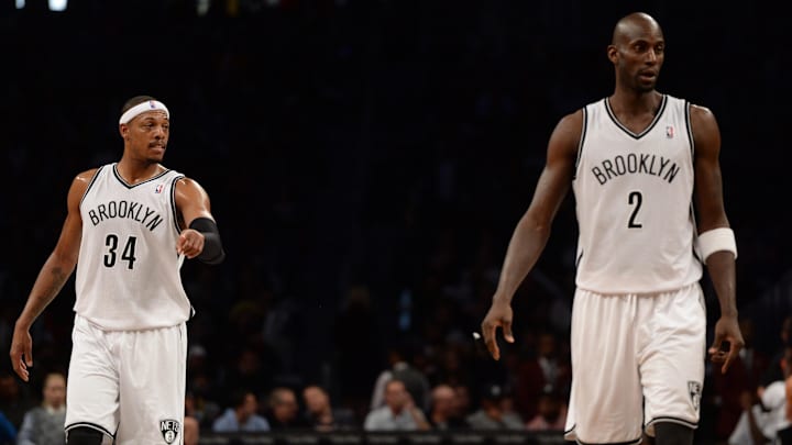 Nov 27, 2013; Brooklyn, NY, USA; Brooklyn Nets small forward Paul Pierce (34) and power forward Kevin Garnett (2) looks on against the Los Angeles Lakers at Barclays Center. The Lakers won 99-94. Mandatory Credit: Joe Camporeale-Imagn Images Nov 27, 2013; Brooklyn, NY, USA; Brooklyn Nets small forward Paul Pierce (34) and power forward Kevin Garnett (2) looks on against the Los Angeles Lakers at Barclays Center. The Lakers won 99-94. Mandatory Credit: Joe Camporeale-Imagn Images