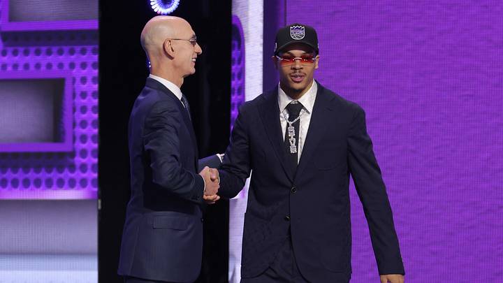 Jun 23, 2026; New York, NY, USA; NBA commissioner Adam Silver greets the seventh pick in the 2026 NBA draft, Arkansas guard Darius Acuff Jr. after he was selected by the Sacramento Kings at Barclays Center. Mandatory Credit: Brad Penner-Imagn Images