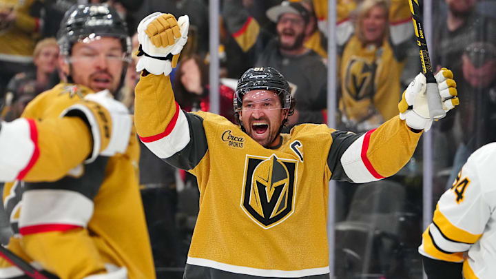 Oct 16, 2025; Las Vegas, Nevada, USA; Vegas Golden Knights right wing Mark Stone (61) celebrates after center Tomas Hertl (48) scored a goal against the Boston Bruins during the second period at T-Mobile Arena. Mandatory Credit: Stephen R. Sylvanie-Imagn Images