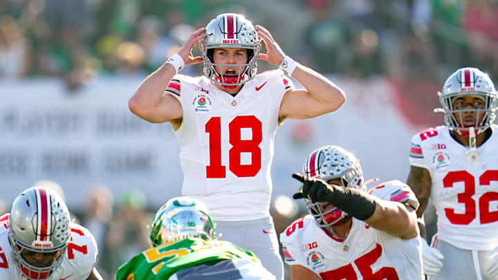 Ohio State Buckeyes quarterback Will Howard (18) motions at the line of scrimmage during the College Football Playoff quarterfinal against the Oregon Ducks at the Rose Bowl in Pasadena, Calif. on Jan. 1, 2025. Ohio State won 41-21.