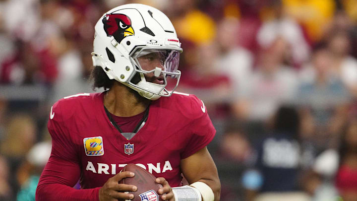Cardinals quarterback Kyler Murray (1) looks for wide receivers against the Commanders during a game at State Farm Stadium in Glendale on Sept. 29, 2024.