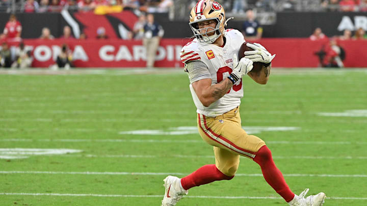 Nov 16, 2025; Glendale, Arizona, USA; San Francisco 49ers tight end George Kittle (85) runs with the ball in the third quarter against the Arizona Cardinals at State Farm Stadium. Mandatory Credit: Matt Kartozian-Imagn Images Nov 16, 2025; Glendale, Arizona, USA; San Francisco 49ers tight end George Kittle (85) runs with the ball in the third quarter against the Arizona Cardinals at State Farm Stadium. Mandatory Credit: Matt Kartozian-Imagn Images