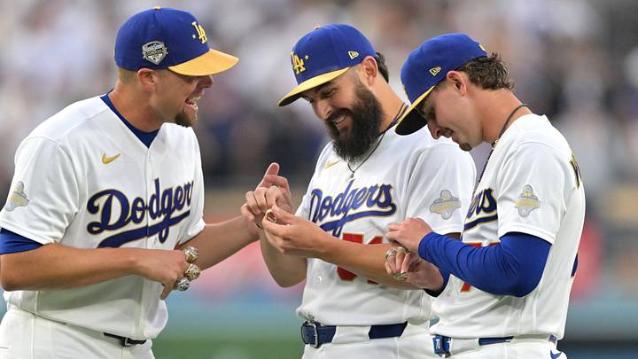 Mar 27, 2026; Los Angeles, California, USA; Los Angeles Dodgers pitcher Blake Treinen (49) and pitcher Alex Vesia (51) and pitcher Justin Wrobleski (70) during the World Series ring ceremony before the game against the Arizona Diamondbacks at Dodger Stadium. Mandatory Credit: Jayne Kamin-Oncea-Imagn Images