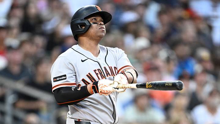 Jul 30, 2026; San Diego, California, USA; San Francisco Giants first baseman Rafael Devers (16) hits a single during the third inning against the San Diego Padres at Petco Park. Mandatory Credit: Denis Poroy-Imagn Images