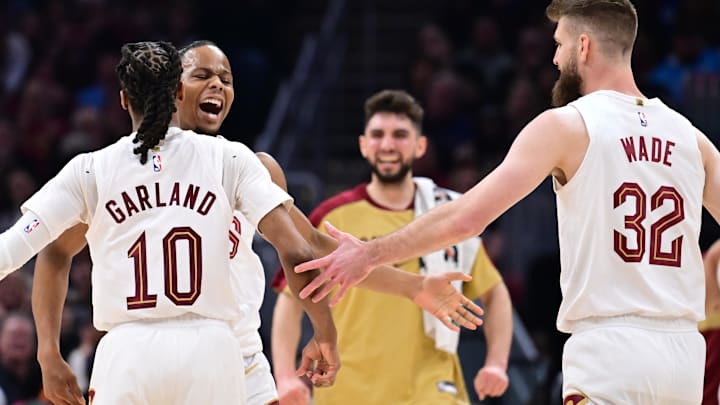 Apr 6, 2025; Cleveland, Ohio, USA; Cleveland Cavaliers forward Isaac Okoro (35) celebrates with guard Darius Garland (10) and forward Dean Wade (32) during the first half against the Sacramento Kings at Rocket Arena. Mandatory Credit: Ken Blaze-Imagn Images