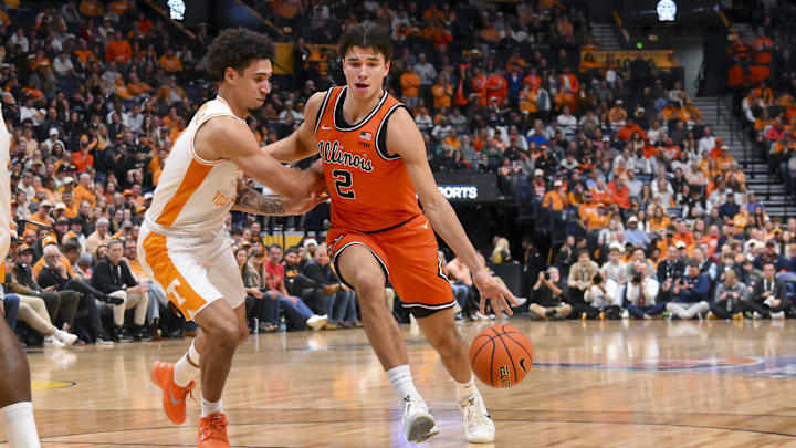 Dec 6, 2025; Nashville, Tennessee, USA;  Illinois Fighting Illini guard Andrej Stojakovic (2) drives to the basket past Tennessee Volunteers guard Bishop Boswell (3) during the second half at Bridgestone Arena. Mandatory Credit: Steve Roberts-Imagn Images
