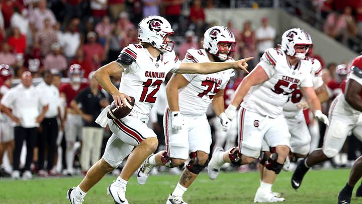 Sep 26, 2026; Tuscaloosa, Alabama, USA; South Carolina Gamecocks quarterback Cutter Woods (12) looks for a receiver during the second half against the Alabama Crimson Tide at Saban Field at Bryant-Denny Stadium. Mandatory Credit: David Leong-Imagn Images Sep 26, 2026; Tuscaloosa, Alabama, USA; South Carolina Gamecocks quarterback Cutter Woods (12) looks for a receiver during the second half against the Alabama Crimson Tide at Saban Field at Bryant-Denny Stadium. Mandatory Credit: David Leong-Imagn Images