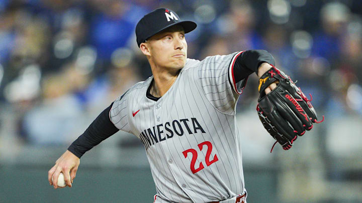 Apr 9, 2025; Kansas City, Missouri, USA; Minnesota Twins relief pitcher Griffin Jax (22) pitches against the Kansas City Royals at Kauffman Stadium. Mandatory Credit: Jay Biggerstaff-Imagn Images