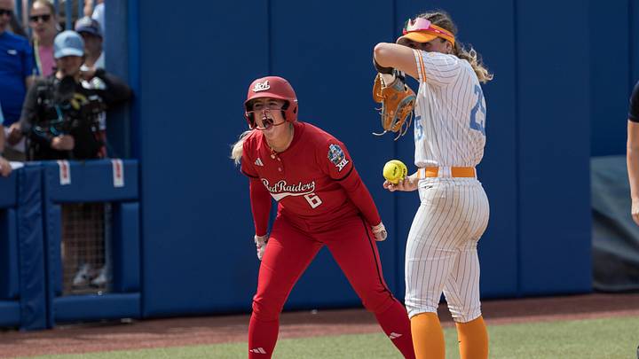 Texas Tech Red Raiders third baseman Taylor Pannell (6) yells towards her dugout after a stolen base as Tennessee Lady Vols infielder Ella Dodge looks on in the seventh inning during the NCAA Women’s College World Series at Devon Park. Texas Tech Red Raiders third baseman Taylor Pannell (6) yells towards her dugout after a stolen base as Tennessee Lady Vols infielder Ella Dodge looks on in the seventh inning during the NCAA Women’s College World Series at Devon Park.