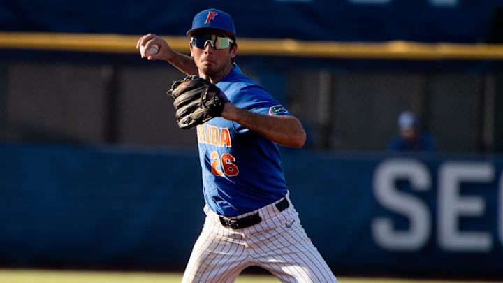 May 28, 2022; Hoover, AL, USA; Florida second baseman Sterlin Thompson (26) throws to first after fielding a bouncer up the middle to record an out against Texas A&M in the SEC Tournament at the Hoover Met in Hoover, Ala., Saturday.