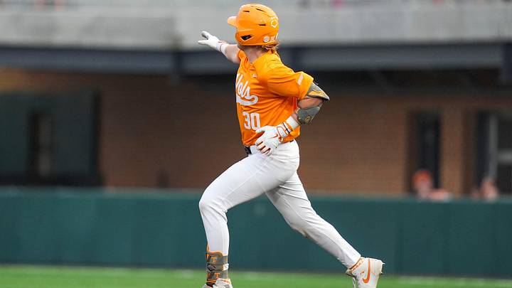 Tennessee catcher Trent Grindlinger (30) points to the outfield after hitting a solo home run during a NCAA baseball game between Tennessee and Ole Miss at Lindsey Nelson Stadium on April 18, 2026.