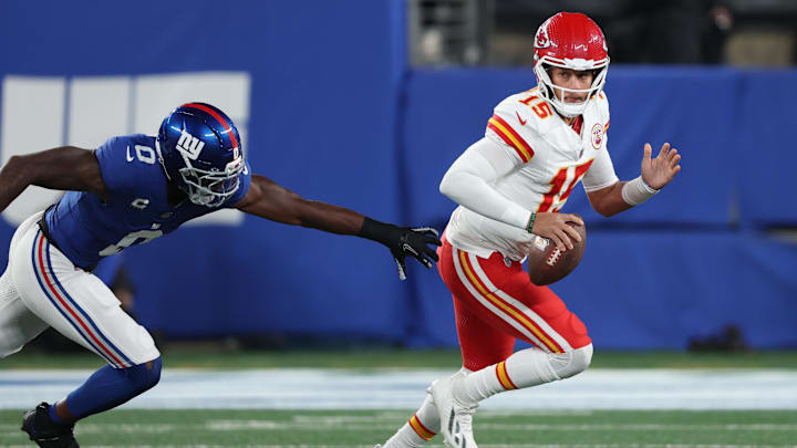 Sep 21, 2025; East Rutherford, New Jersey, USA; Kansas City Chiefs quarterback Patrick Mahomes (15) runs against New York Giants linebacker Brian Burns (0) in the first quarter at MetLife Stadium. Mandatory Credit: Vincent Carchietta-Imagn Images Sep 21, 2025; East Rutherford, New Jersey, USA; Kansas City Chiefs quarterback Patrick Mahomes (15) runs against New York Giants linebacker Brian Burns (0) in the first quarter at MetLife Stadium. Mandatory Credit: Vincent Carchietta-Imagn Images