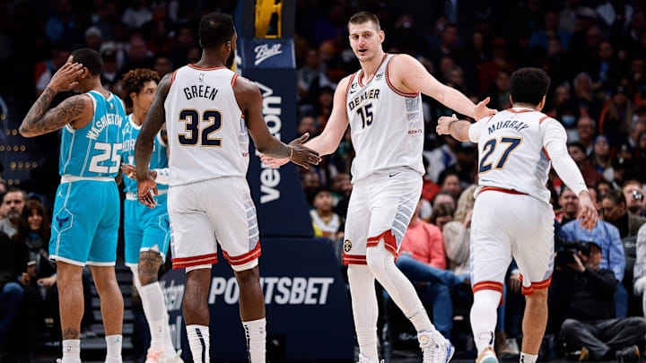 Dec 18, 2022; Denver, Colorado, USA; Denver Nuggets center Nikola Jokic (15) reacts with forward