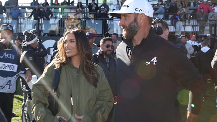 Dustin Johnson captain of 4Aces GC celebrates with his wife Paulina Gretzky after winning the LIV Golf tournament in Las Vegas.