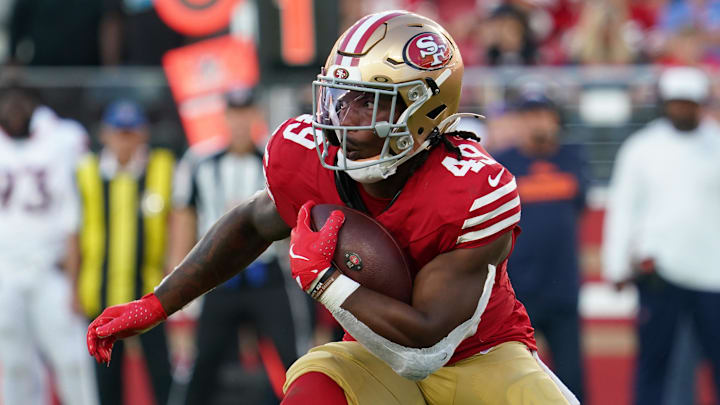 Aug 9, 2025; Santa Clara, California, USA;  San Francisco 49ers running back Corey Kiner (49) runs the ball in the second quarter against Denver Broncos at Levi's Stadium. Mandatory Credit: David Gonzales-Imagn Images