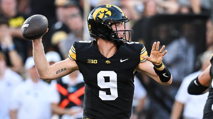 Sep 27, 2025; Iowa City, Iowa, USA; Iowa Hawkeyes quarterback Hank Brown (9) throws a pass against the Indiana Hoosiers during the fourth quarter at Kinnick Stadium. Mandatory Credit: Jeffrey Becker-Imagn Images
