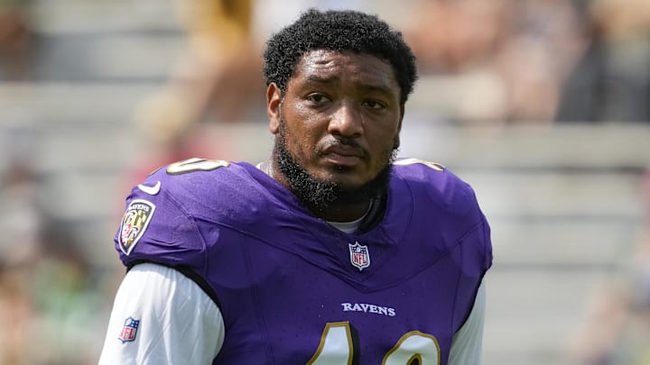 Aug 24, 2024; Green Bay, Wisconsin, USA;  Baltimore Ravens linebacker Malik Harrison (40) during warmups prior to the game against the Green Bay Packers at Lambeau Field. Mandatory Credit: Jeff Hanisch-Imagn Images