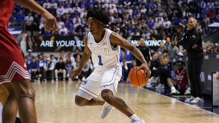 Mar 7, 2026; Provo, Utah, USA; BYU Cougars guard Robert Wright III (1) controls the ball during the first half against the Texas Tech Red Raiders at Marriott Center. Mandatory Credit: Aaron Baker-Imagn Images 