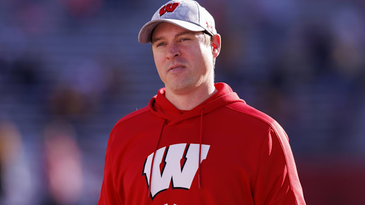 Wisconsin Badgers head coach Jim Leonhard looks on during warmups prior to the game against the Minnesota Golden Gophers.