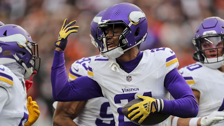 Dec 16, 2023; Cincinnati, Ohio, USA; Minnesota Vikings cornerback Akayleb Evans (21) reacts after intercepting the ball in the second half against the Cincinnati Bengals at Paycor Stadium. Dec 16, 2023; Cincinnati, Ohio, USA; Minnesota Vikings cornerback Akayleb Evans (21) reacts after intercepting the ball in the second half against the Cincinnati Bengals at Paycor Stadium.