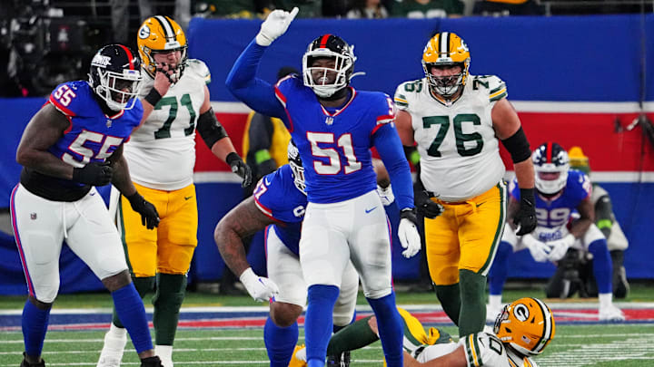 Dec 11, 2023; East Rutherford, New Jersey, USA; New York Giants linebacker Azeez Ojulari (51) celebrates after making a sack on Green Bay Packers quarterback Jordan Love.