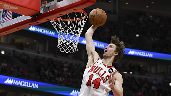 Mar 10, 2025; Chicago, Illinois, USA; Chicago Bulls forward Matas Buzelis (14) dunks the ball