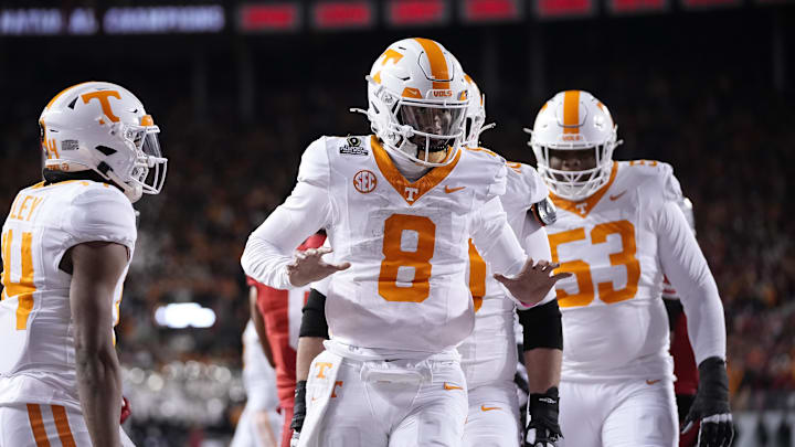 Dec 21, 2024; Columbus, Ohio, USA; Tennessee Volunteers quarterback Nico Iamaleava (8) celebrates after running for a touchdown against the Ohio State Buckeyes during the first half of a College Football Playoff first round game at Ohio Stadium. Mandatory Credit: Adam Cairns-Imagn Images