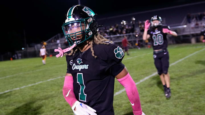Westland's Emoni Smith (1) celebrates