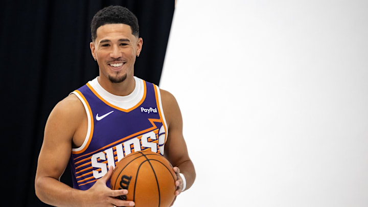 Sep 24, 2025; Phoenix, AZ, USA; Phoenix Suns guard Devin Booker (1) poses for portrait during Media Day at PHX Arena. Mandatory Credit: Mark J. Rebilas-Imagn Images Sep 24, 2025; Phoenix, AZ, USA; Phoenix Suns guard Devin Booker (1) poses for portrait during Media Day at PHX Arena. Mandatory Credit: Mark J. Rebilas-Imagn Images